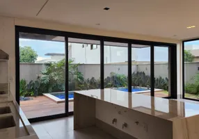 Foto 1 de Casa de Condomínio com 4 Quartos à venda, 295m² em PORTAL DO SOL GREEN, Goiânia