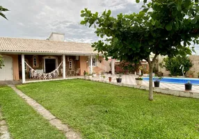 Foto 1 de Casa com 4 Quartos à venda, 130m² em Zona Nova, Capão da Canoa