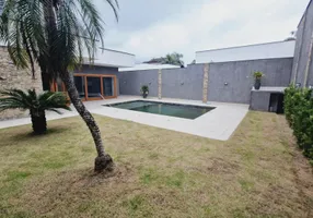 Foto 1 de Casa de Condomínio com 4 Quartos à venda, 290m² em Morada da Praia, Bertioga