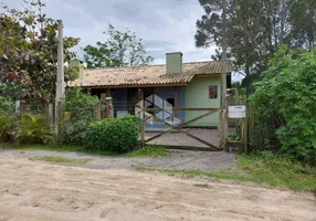 Foto 1 de Casa com 4 Quartos à venda, 150m² em Praia da Ferrugem, Garopaba