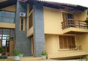Foto 1 de Casa com 4 Quartos à venda, 369m² em Espiríto Santo, Porto Alegre