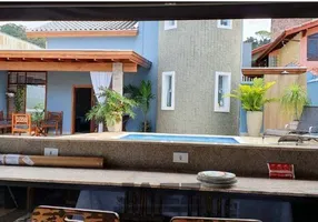 Foto 1 de Casa com 6 Quartos à venda, 206m² em Jardim Estrela D¿Alva, Caraguatatuba