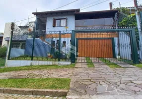 Foto 1 de Casa com 3 Quartos à venda, 293m² em Cavalhada, Porto Alegre