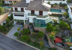 Foto 1 de Casa com 4 Quartos para alugar, 570m² em Condominio Marambaia, Vinhedo