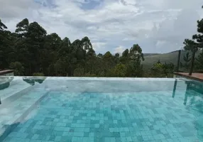 Foto 1 de Casa de Condomínio com 4 Quartos para venda ou aluguel, 345m² em Alphaville Lagoa Dos Ingleses, Nova Lima