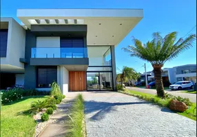Foto 1 de Casa de Condomínio com 4 Quartos para venda ou aluguel, 250m² em Xangri la, Xangri-lá