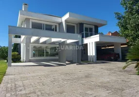 Foto 1 de Casa de Condomínio com 4 Quartos para alugar, 500m² em Belém Novo, Porto Alegre