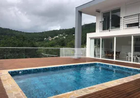 Foto 1 de Casa de Condomínio com 4 Quartos à venda, 343m² em Itacorubi, Florianópolis