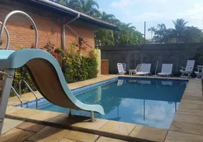 Foto 1 de Sobrado com 4 Quartos à venda, 235m² em Jardim Virgínia , Guarujá