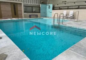 Foto 1 de Apartamento com 4 Quartos à venda, 146m² em Pitangueiras, Guarujá