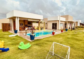 Foto 1 de Casa de Condomínio com 4 Quartos à venda, 160m² em Barra do Jacuípe, Camaçari