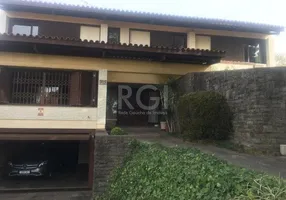 Foto 1 de Casa com 3 Quartos à venda, 407m² em Três Figueiras, Porto Alegre