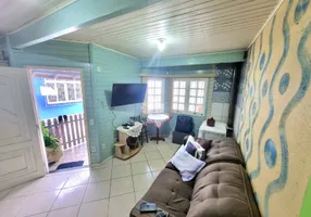 Foto 1 de Casa com 4 Quartos à venda, 149m² em Estância Velha, Canoas