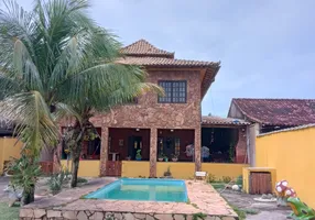 Foto 1 de Casa com 4 Quartos à venda, 140m² em Unamar, Cabo Frio