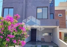 Foto 1 de Casa de Condomínio com 3 Quartos à venda, 216m² em Mário Quintana, Porto Alegre