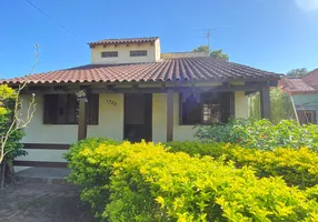 Foto 1 de Casa com 2 Quartos à venda, 189m² em Vila Nova, Porto Alegre