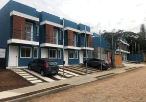 Foto 1 de Casa com 2 Quartos à venda, 54m² em Tarumã, Viamão