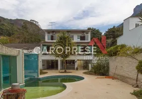 Foto 1 de Casa com 5 Quartos à venda, 550m² em Barra da Tijuca, Rio de Janeiro