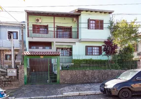 Foto 1 de Casa com 3 Quartos à venda, 201m² em Vila Nova, Porto Alegre