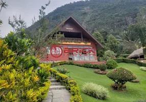 Foto 1 de Casa de Condomínio com 5 Quartos à venda, 365m² em Carlos Guinle, Teresópolis