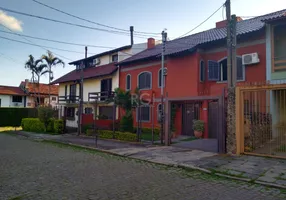 Foto 1 de Casa com 4 Quartos à venda, 269m² em Guarujá, Porto Alegre