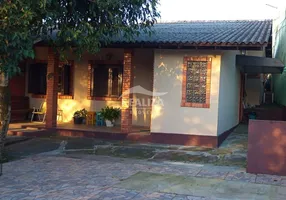 Foto 1 de Casa com 2 Quartos à venda, 131m² em Tarumã, Viamão