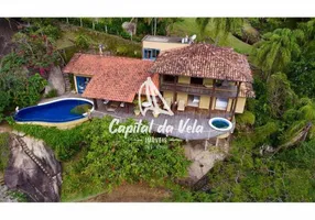 Foto 1 de Casa de Condomínio com 4 Quartos à venda, 245m² em Santa Tereza, Ilhabela