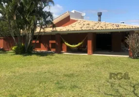 Foto 1 de Casa com 4 Quartos à venda, 211m² em Atlantida, Xangri-lá