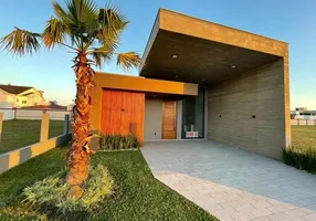 Foto 1 de Casa com 4 Quartos à venda, 170m² em Zona Nova, Capão da Canoa