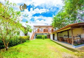 Foto 1 de Casa com 6 Quartos para venda ou aluguel, 130m² em Balneário Praia do Pernambuco, Guarujá