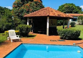 Foto 1 de Casa de Condomínio com 4 Quartos à venda, 300m² em Condominio Quinta da Boa Vista, Ribeirão Preto