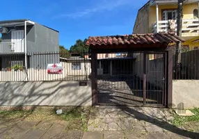 Foto 1 de Casa com 3 Quartos à venda, 82m² em Vila Nova, Porto Alegre