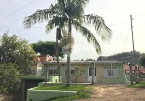 Foto 1 de Casa com 3 Quartos à venda, 164m² em Vila Nova, Porto Alegre