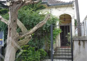 Foto 1 de Casa com 4 Quartos à venda, 180m² em Auxiliadora, Porto Alegre
