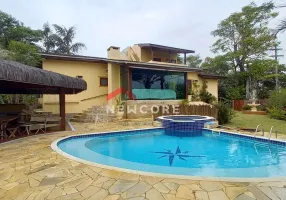 Foto 1 de Casa de Condomínio com 4 Quartos à venda, 300m² em Praia das Toninhas, Ubatuba