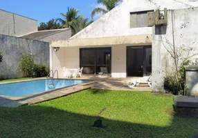 Foto 1 de Casa com 4 Quartos à venda, 268m² em Balneário Praia do Pernambuco, Guarujá