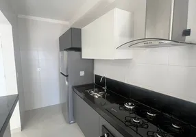 Foto 1 de Apartamento com 2 Quartos para alugar, 75m² em Canto do Forte, Praia Grande