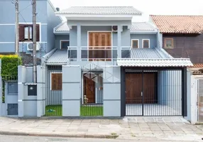Foto 1 de Casa com 3 Quartos à venda, 229m² em Vila Nova, Porto Alegre