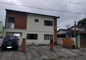 Foto 1 de Casa de Condomínio com 4 Quartos à venda, 220m² em Balneario Copacabana, Caraguatatuba