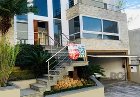 Foto 1 de Casa de Condomínio com 3 Quartos à venda, 398m² em Agronomia, Porto Alegre