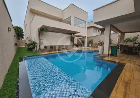 Foto 1 de Casa de Condomínio com 5 Quartos à venda, 456m² em Alphaville Flamboyant Residencial Araguaia, Goiânia
