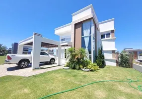 Foto 1 de Casa de Condomínio com 4 Quartos à venda, 200m² em Condominio Maritimo, Tramandaí
