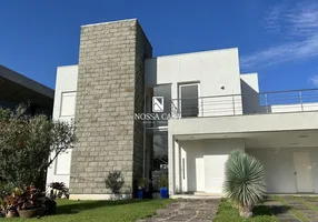 Foto 1 de Casa de Condomínio com 4 Quartos à venda, 320m² em Itapeva, Torres
