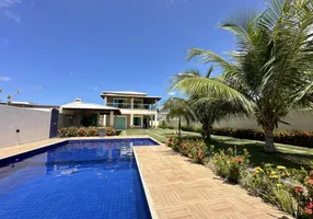 Foto 1 de Casa de Condomínio com 4 Quartos à venda, 250m² em Barra do Jacuípe, Camaçari