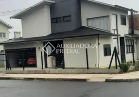 Foto 1 de Casa de Condomínio com 4 Quartos à venda, 175m² em Mário Quintana, Porto Alegre
