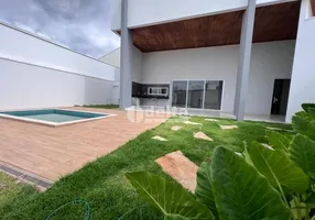 Foto 1 de Casa de Condomínio com 3 Quartos à venda, 260m² em Laranjeiras, Uberlândia
