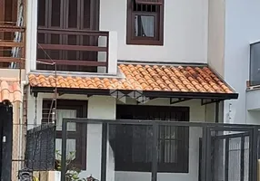 Foto 1 de Casa com 2 Quartos à venda, 108m² em Guarujá, Porto Alegre