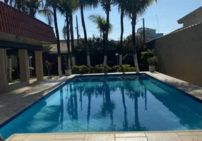 Foto 1 de Sobrado com 4 Quartos à venda, 380m² em Jardim Real, Praia Grande