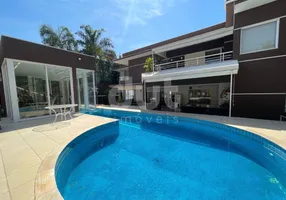 Foto 1 de Casa de Condomínio com 4 Quartos para venda ou aluguel, 630m² em Loteamento Alphaville Campinas, Campinas