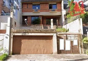 Foto 1 de Casa com 3 Quartos à venda, 297m² em Rio Branco, Porto Alegre